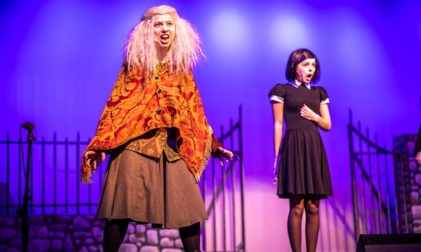 Students perform onstage